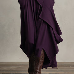 Purple asymmetrical maxi knit dress with draped skirt panels and roll neck, long sleeves