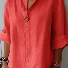 Relaxed red button-up top with V-neck and short sleeves, front button placket.