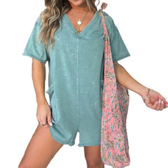 Washed gray-green short-sleeve V-neck romper with patch pockets and relaxed fit