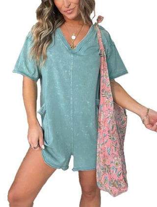 Washed gray-green short-sleeve V-neck romper with patch pockets and relaxed fit