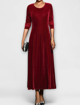 Red soft velvet dress with long sleeves, round neck, fitted bodice and midi skirt