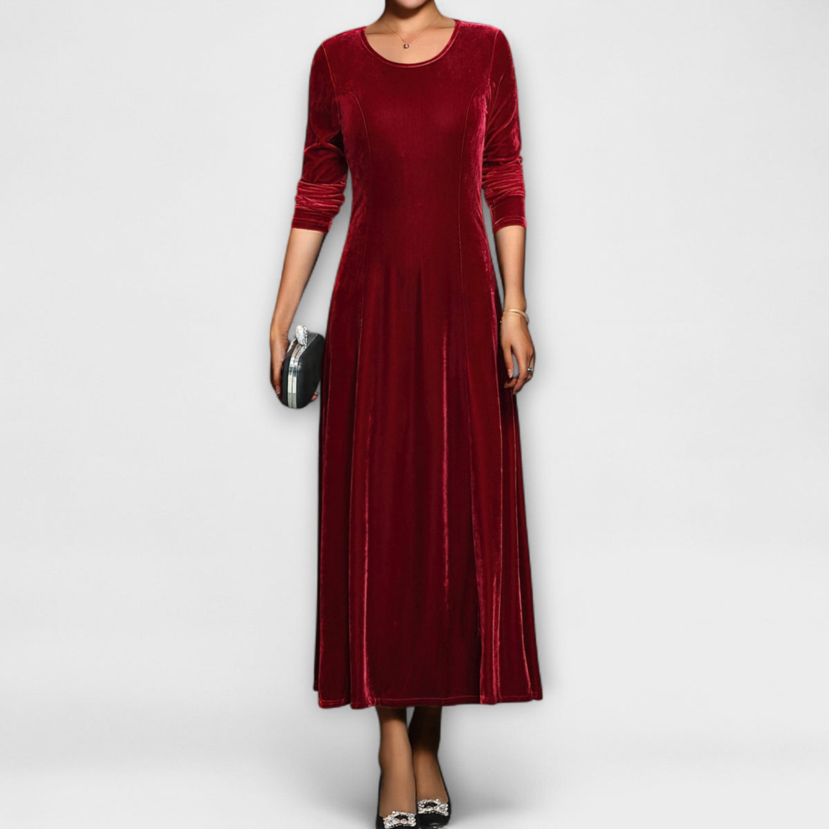 Red soft velvet dress with long sleeves, round neck, fitted bodice and midi skirt
