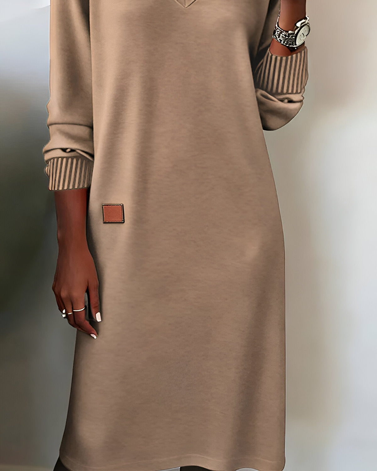 Brown V-neck knit midi dress, square side patch and ribbed striped cuffs