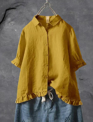 Mustard yellow button-up blouse top with collar, short sleeves, and ruffled hem