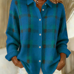 Blue plaid knit vest with V-neck, button front, long sleeves, ribbed cuffs.