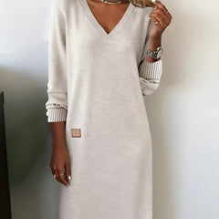 White V-neck midi dress with ribbed striped cuffs and small square side patch