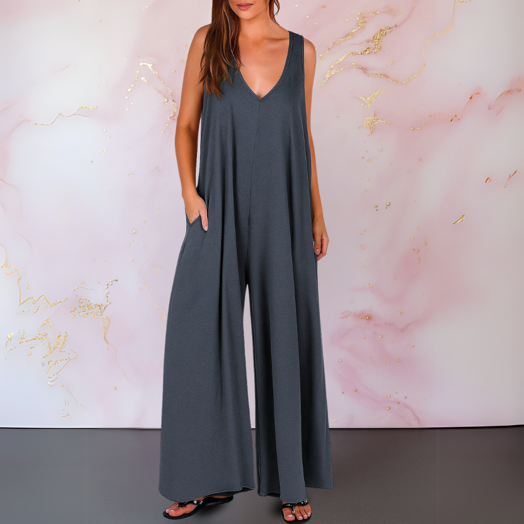 Grey wide-leg sleeveless jumpsuit with V-neck and wide flowing legs