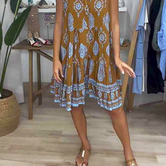 Caramel-brown V-neck sleeveless dress with blue-and-white ornate print
