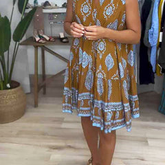 Caramel-brown V-neck sleeveless dress with blue-and-white medallion pattern