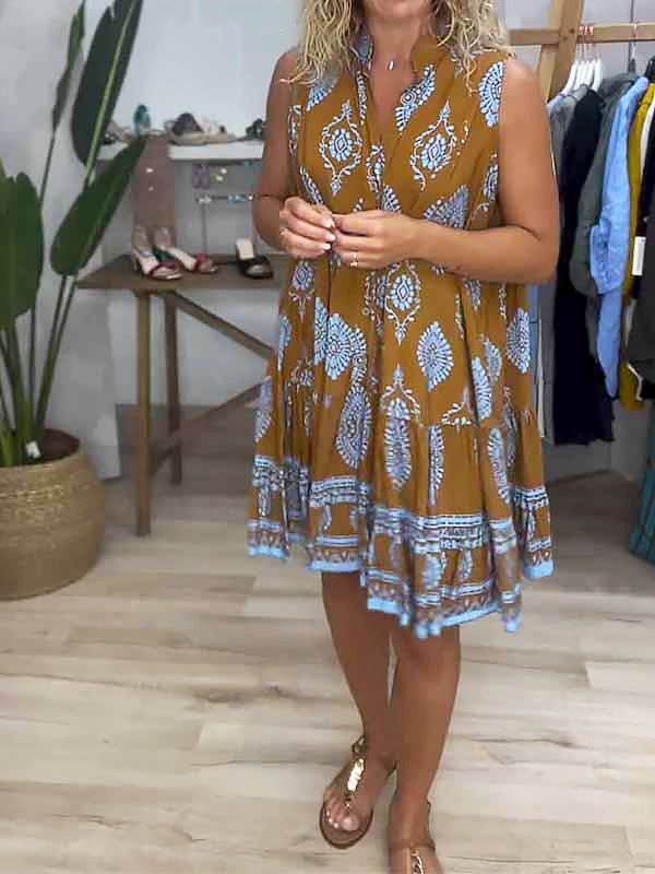 Caramel-brown V-neck sleeveless dress with blue-and-white medallion pattern