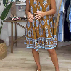 Caramel-brown V-neck sleeveless dress with flared hem and blue-and-white print