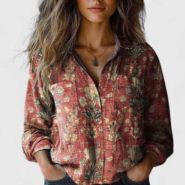 Red floral button-up blouse with long sleeves and chest patch pockets
