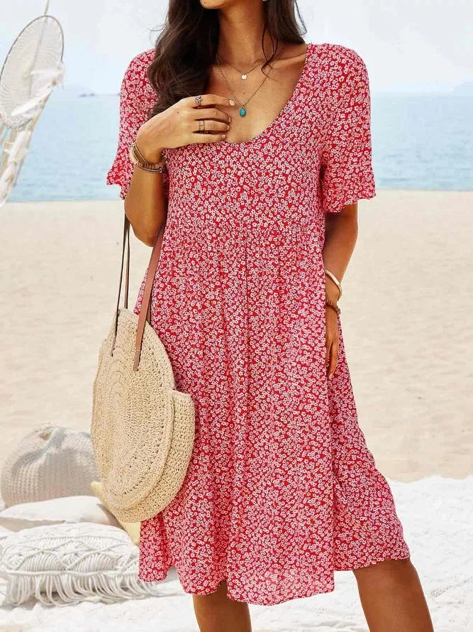 Red floral babydoll dress with V-neck and short sleeves, knee-length
