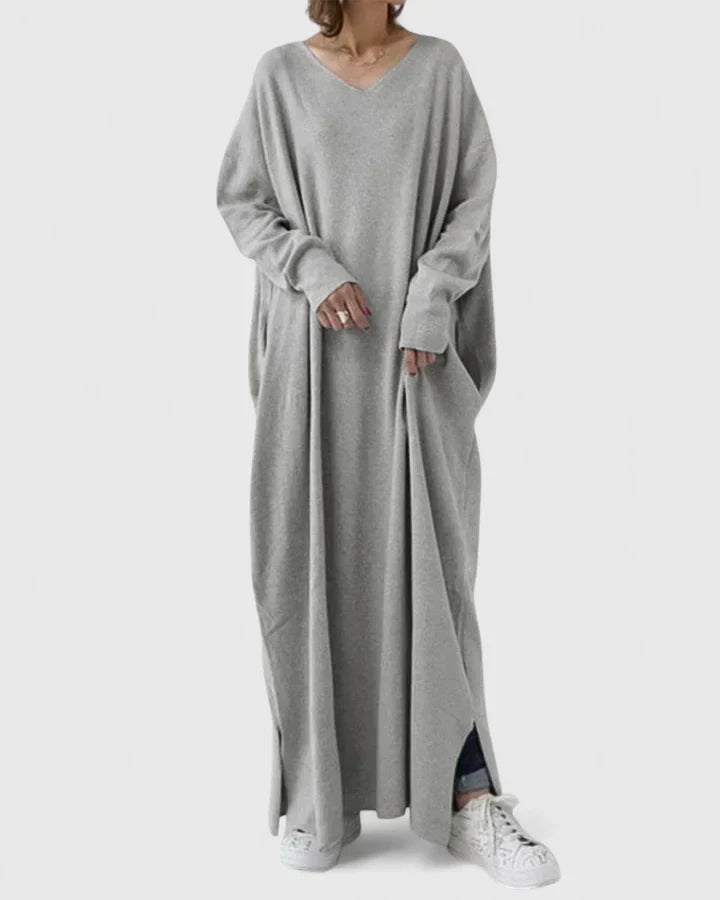 Gray long-sleeve maxi dress with V-neck and relaxed drape, side slit hem