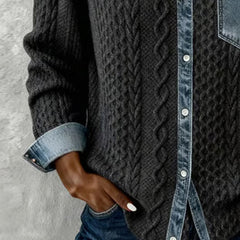 Dark gray long-sleeve cable-knit shirt detail with denim cuff and buttoned placket