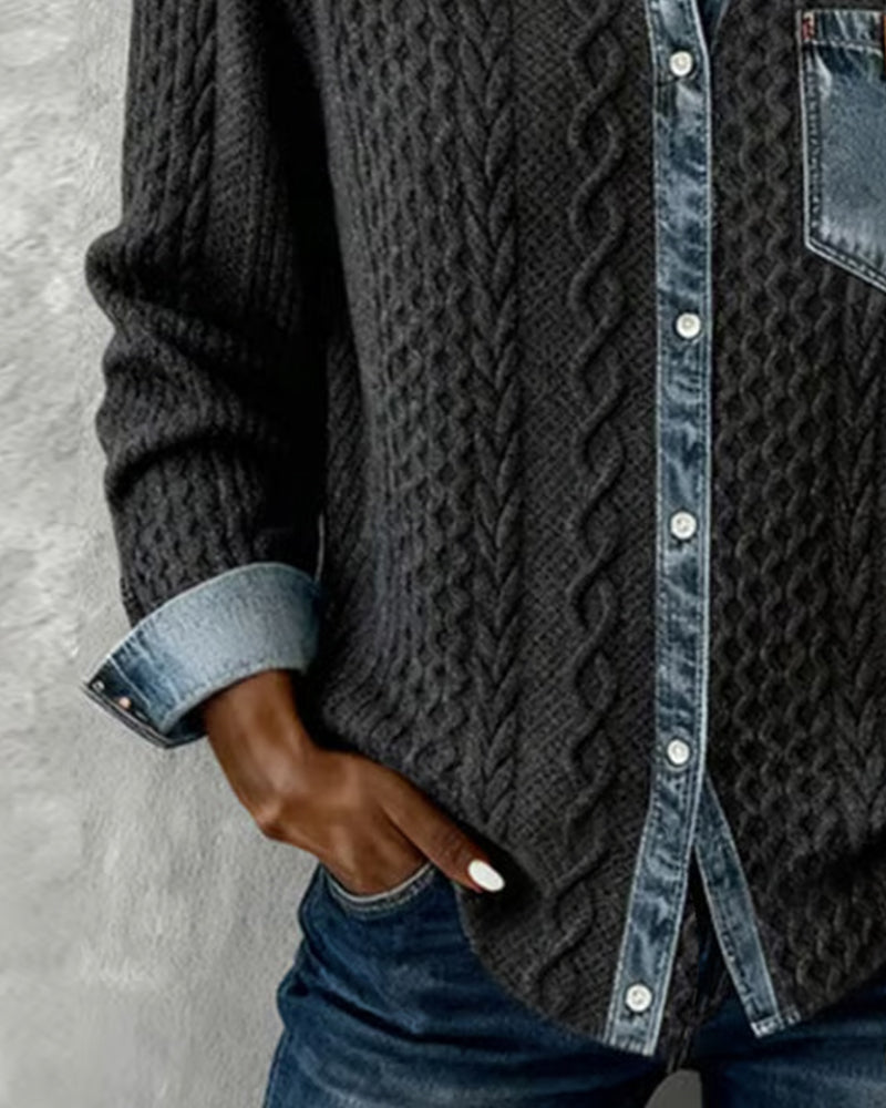 Dark gray long-sleeve cable-knit shirt detail with denim cuff and buttoned placket