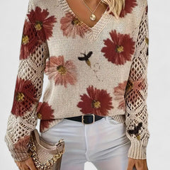 Beige V-neck cardigan with red and pink flower print, crochet lace sleeves