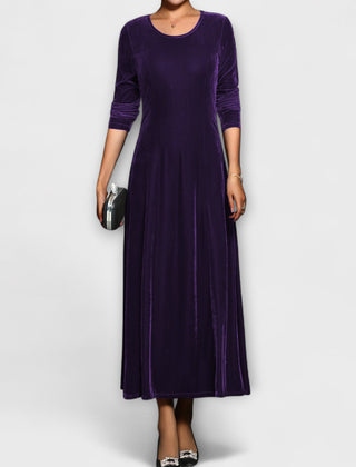 Purple soft velvet dress with long sleeves, round neck, fitted bodice and midi skirt