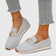 White mesh slip-on loafer sneakers with gold buckle detail and traction outsole