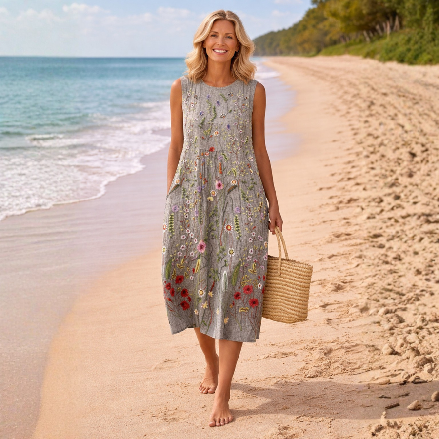 Sleeveless gray midi dress with multicolor wildflower pattern, round neckline, flared hem