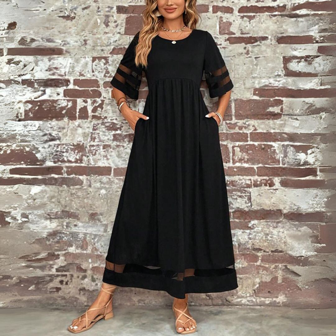 Black midi babydoll dress with gathered waist, elbow sleeves, sheer stripe accents