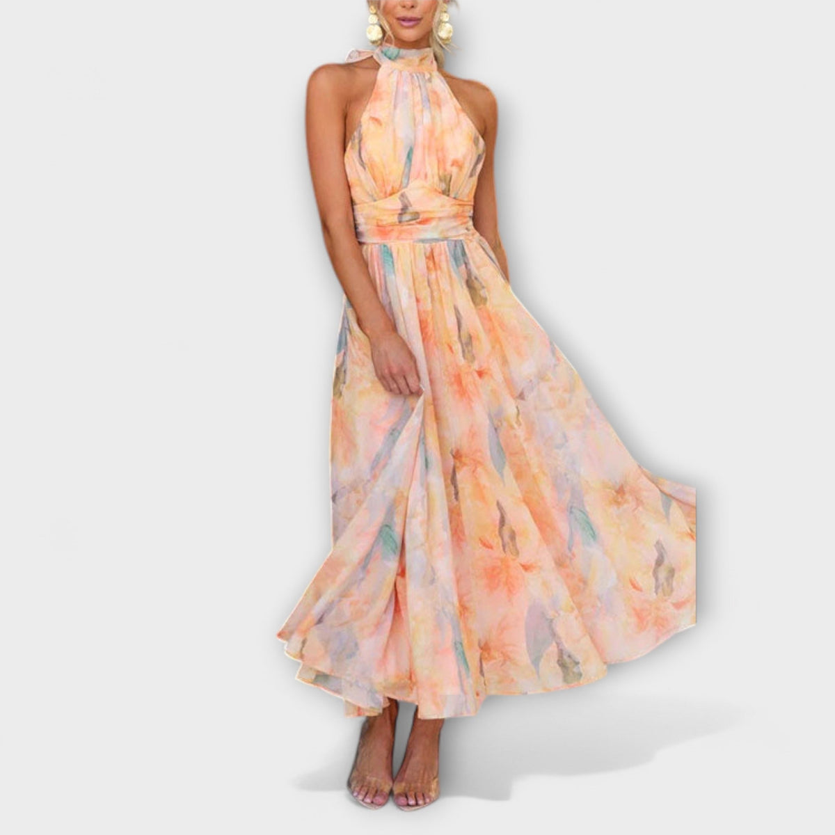 Halter neck midi dress with pastel watercolor orange and blue floral print, fitted waist