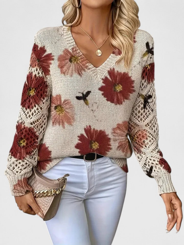 Floral knit V-neck cardigan with long sleeves, off-white base with red and pink flowers