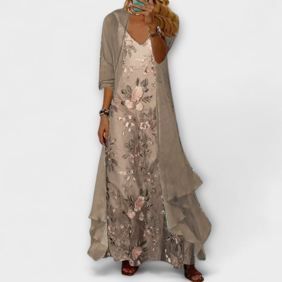 Beige maxi dress with long sleeves, floral embroidery and layered skirt hem