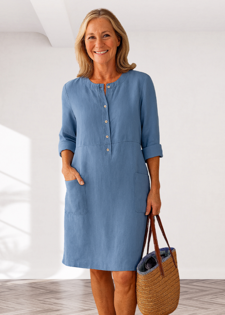 Light blue linen-look everyday dress with front buttons, three-quarter sleeves, side pockets