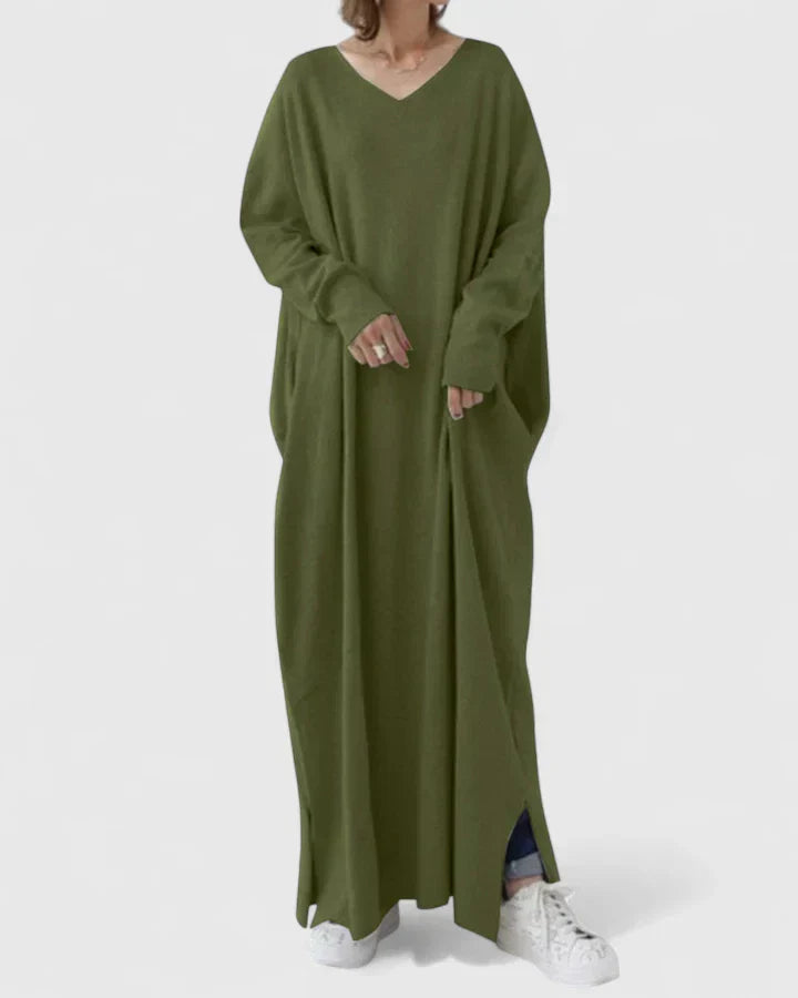 Dark green long-sleeve maxi dress with V-neck and relaxed drape, side slit hem