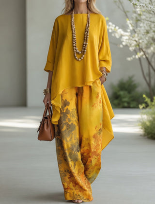 Mustard yellow long tunic top and wide-leg printed pants set with draped ruffle hem