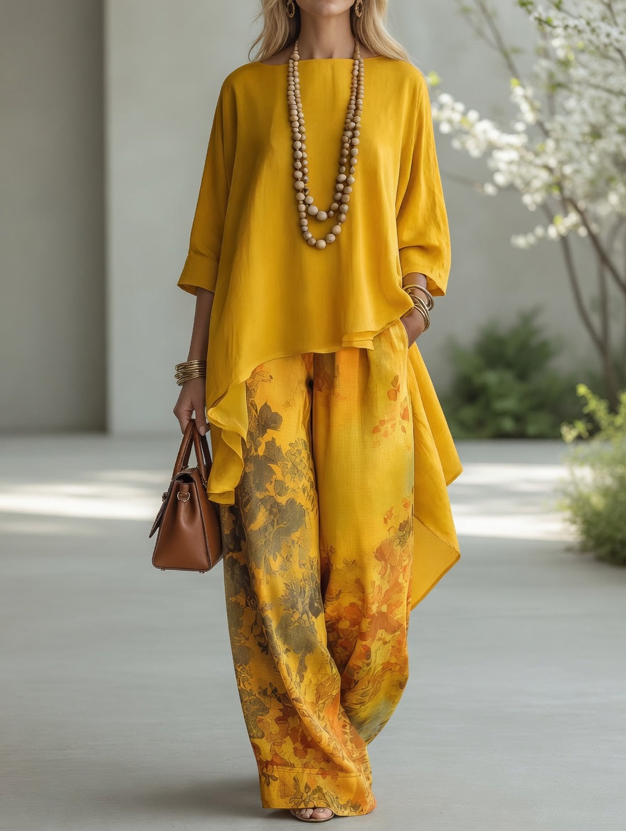 Mustard yellow long tunic top and wide-leg printed pants set with draped ruffle hem
