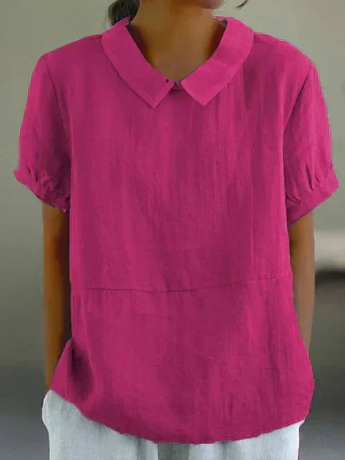 Pink short-sleeve collared shirt with V-neck and front seam detail