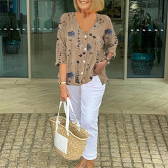 Printed button tunic top in khaki with floral pattern, three-quarter sleeves