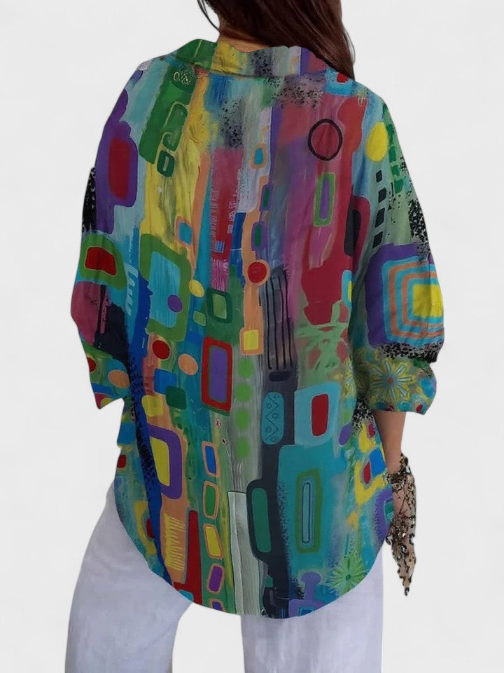 Rose™ geometric print blouse back view with rounded yoke and wide sleeves