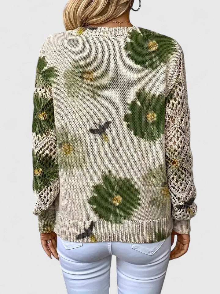Cream knit cardigan with green floral and bird pattern, V-neck and openwork sleeves
