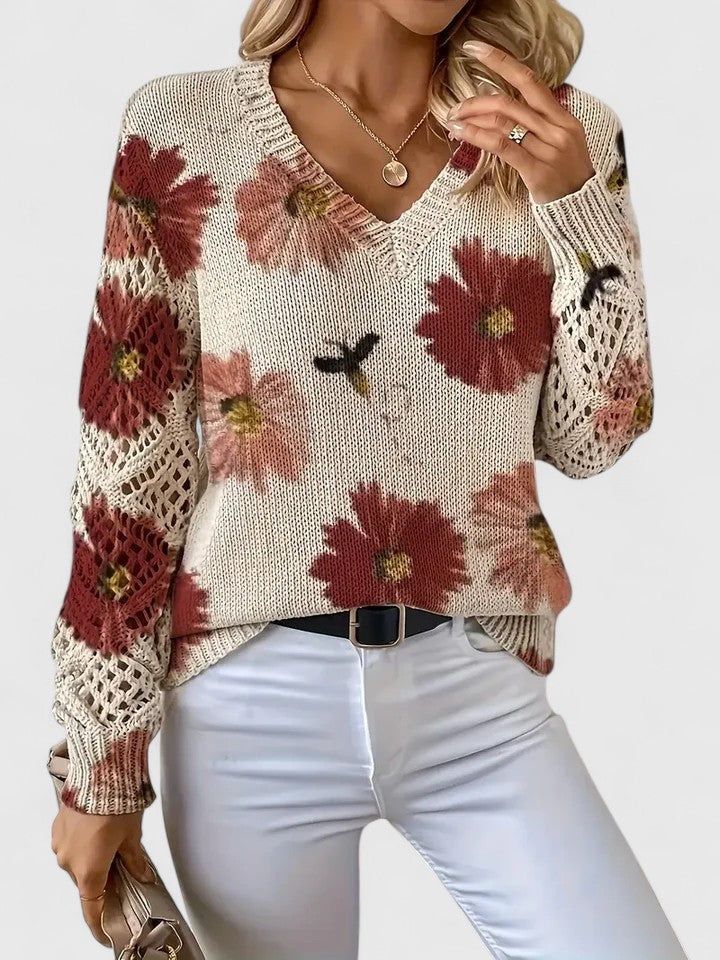 Beige V-neck cardigan with red, pink, and floral print, crochet lace sleeve details