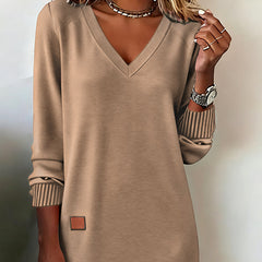 Beige comfortable V-neck dress with ribbed cuffs and small square chest patch