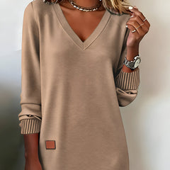 Brown V-neck midi dress with 3/4 sleeves, ribbed striped cuffs, square side patch