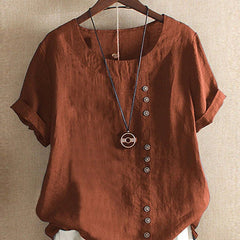 Rust-brown summer tee with V-neck, front button placket, short sleeves and pendant charm