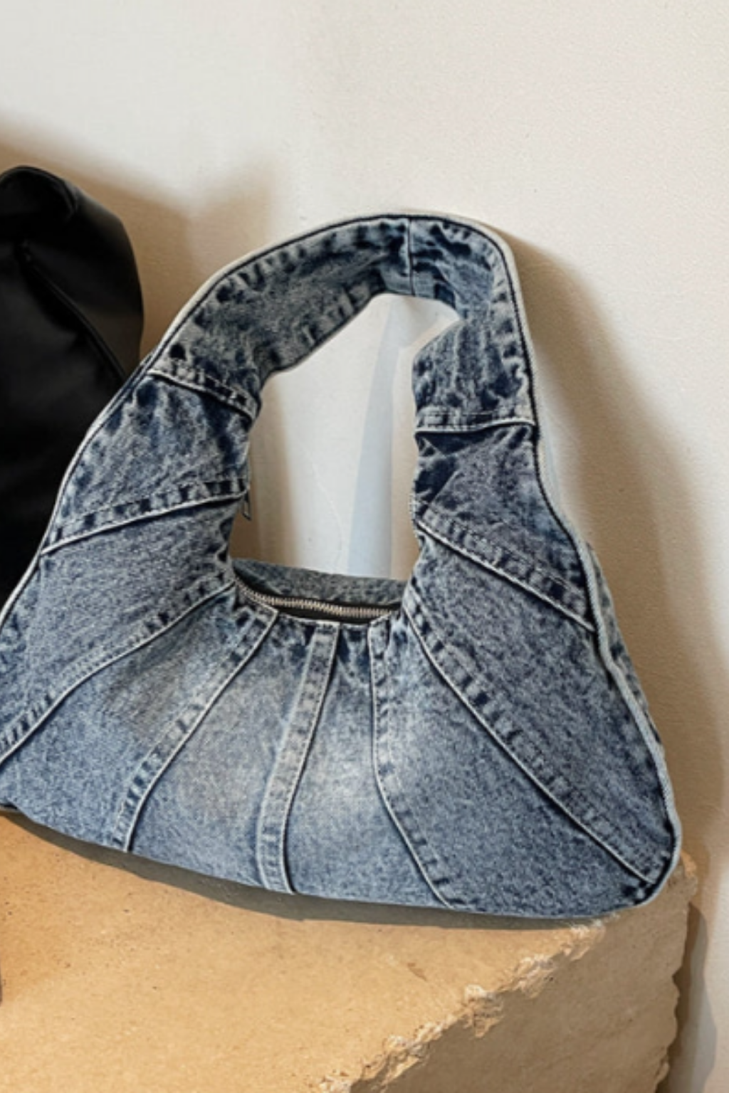 Light blue denim shoulder bag with wide handles and open top view