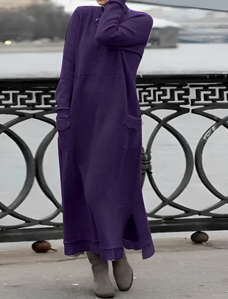 Purple hooded winter maxi dress with long sleeves, front pockets, and side slit