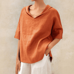 Oversized linen shirt in tangerine orange with V-neck and short sleeves