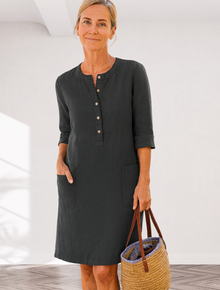 Black linen-look everyday dress with front buttons, three-quarter sleeves, side pockets