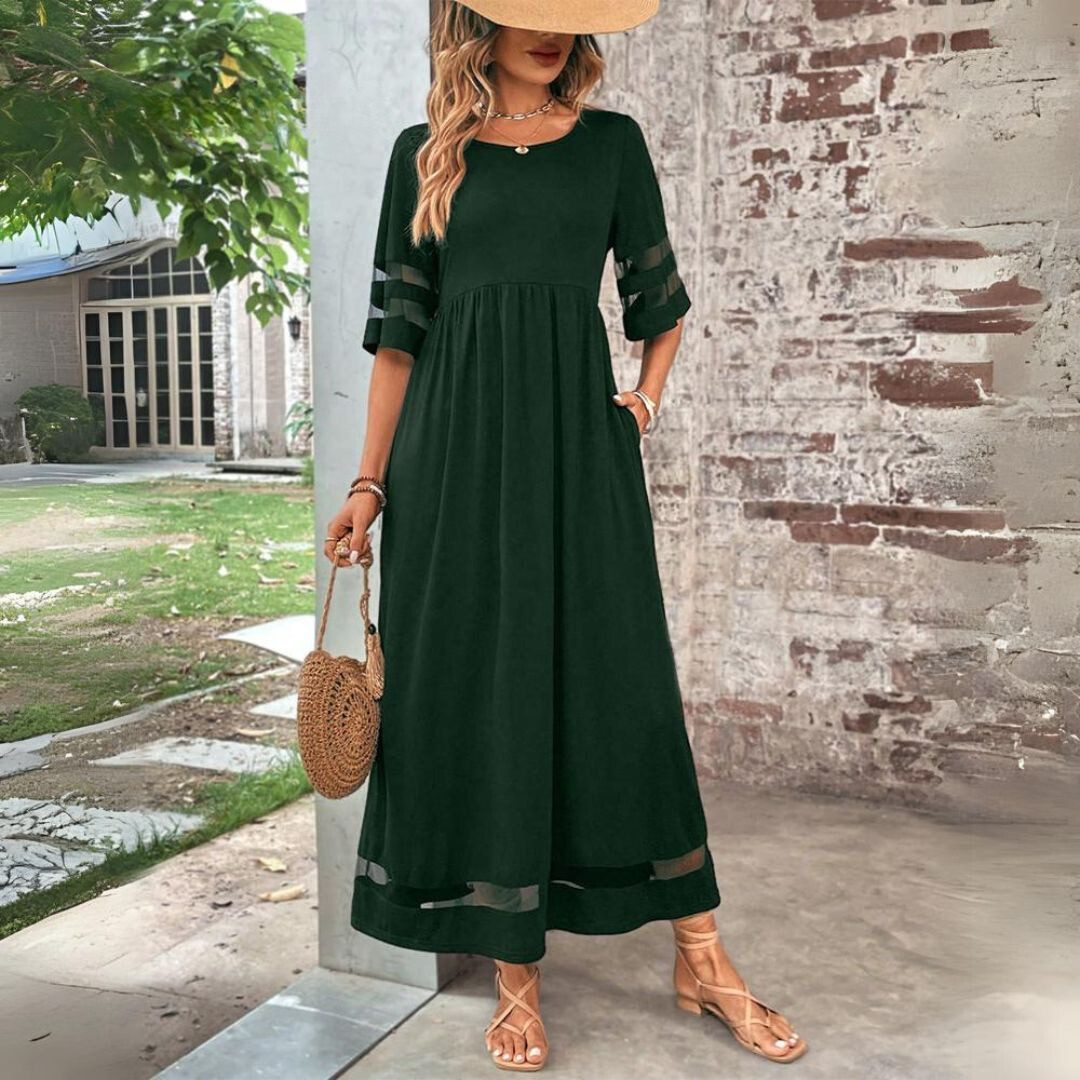 Green midi dress with gathered waist, elbow sleeves with sheer stripe, dark hem band
