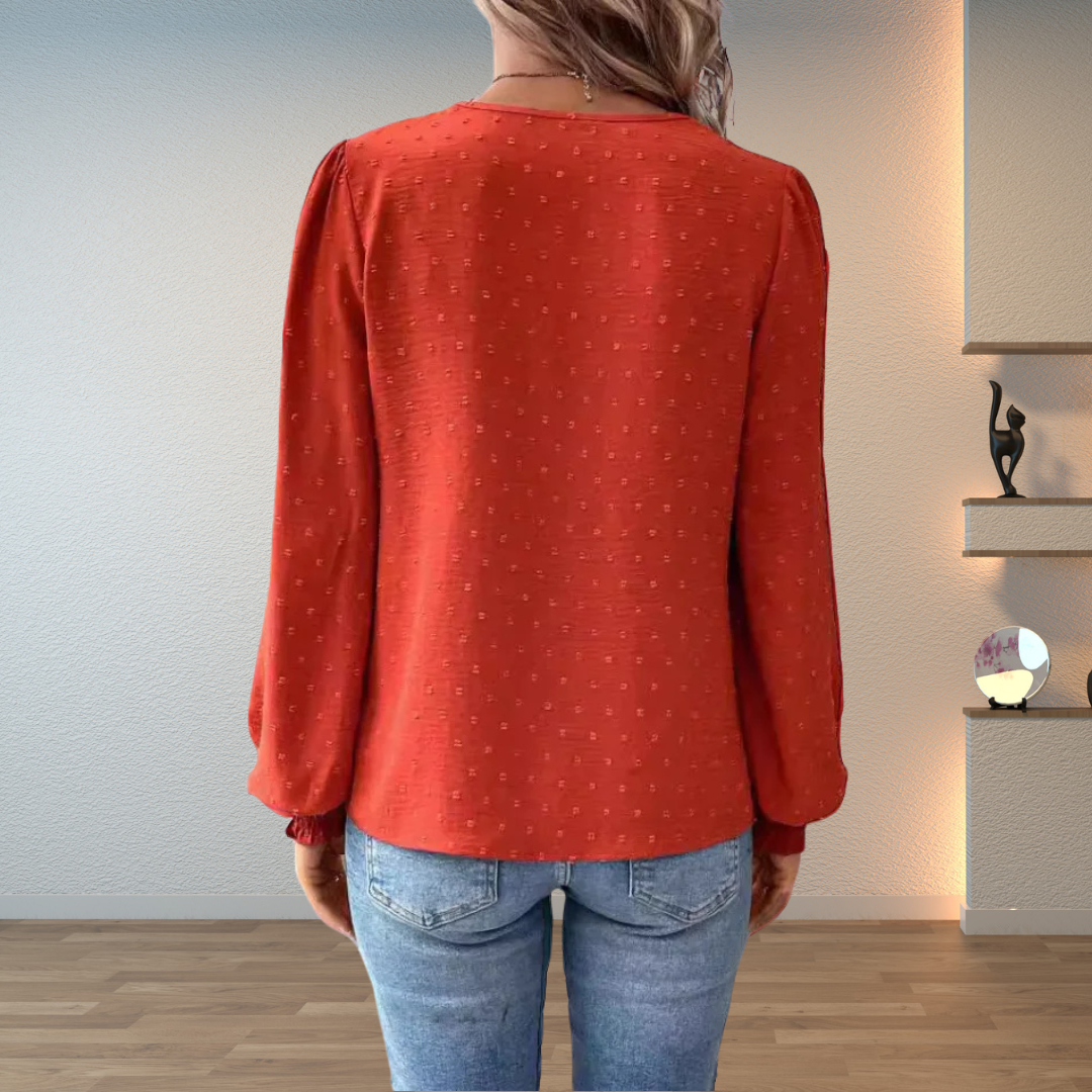 Red embroidered lightweight blouse back view with long sleeves and gathered cuffs