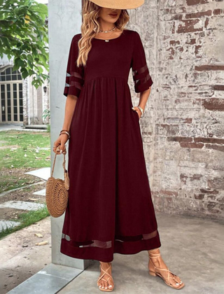 Red midi dress with gathered waist, elbow sleeves with sheer stripe, tiered dark hem