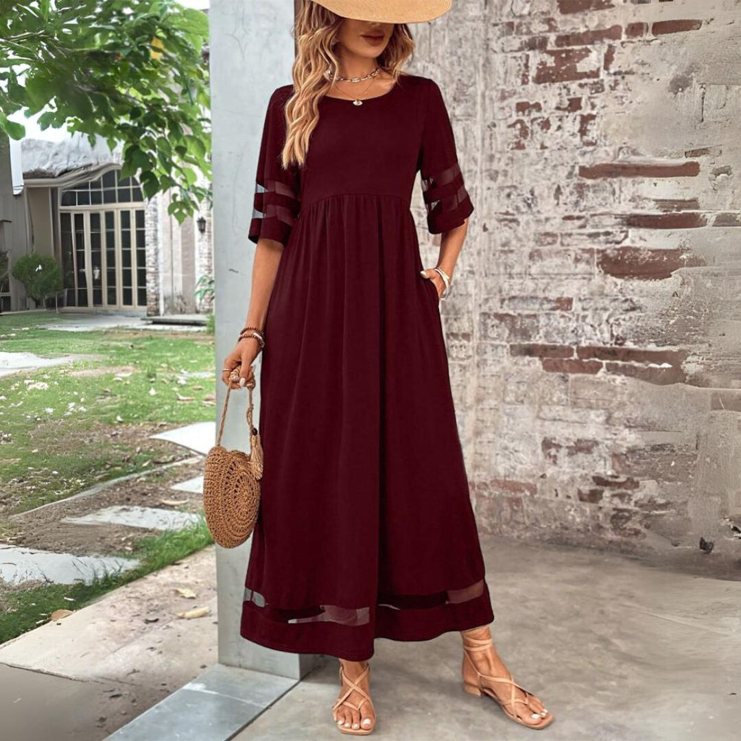Red midi dress with gathered waist, elbow sleeves with sheer stripe, tiered dark hem