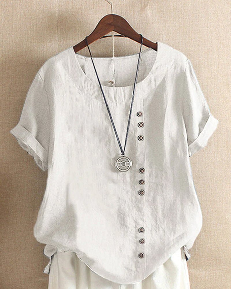 White summer tee with V-neck, front button placket, short sleeves and pendant charm