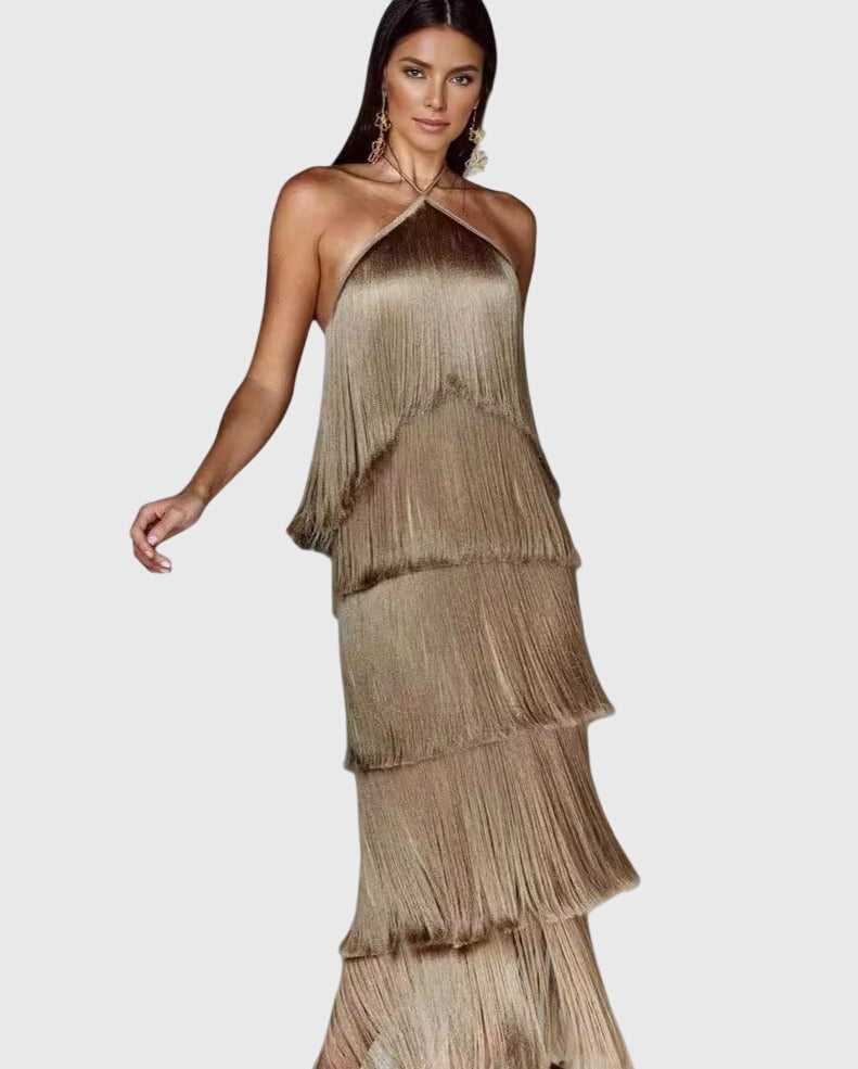 Gold halter tassel dress with vertical fringe layers and low halter neckline